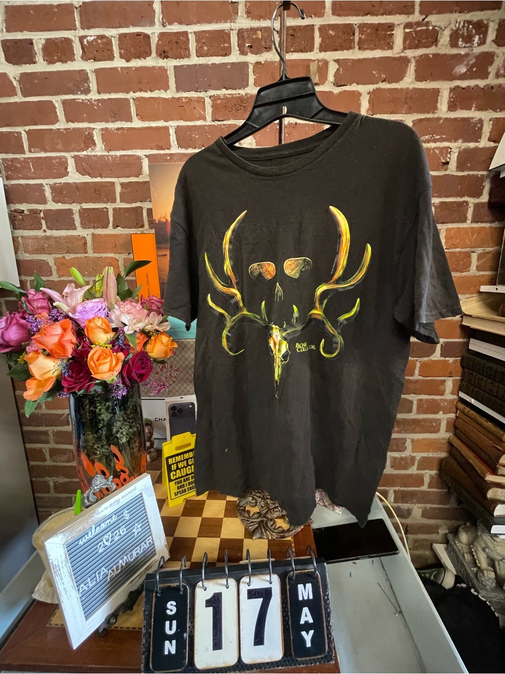 Bone Collector" graphic t-shirt featuring a deer skull design